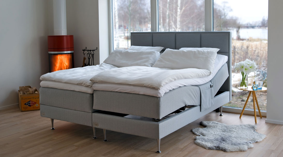 Exclusive Ställbar – full bed in a styled room